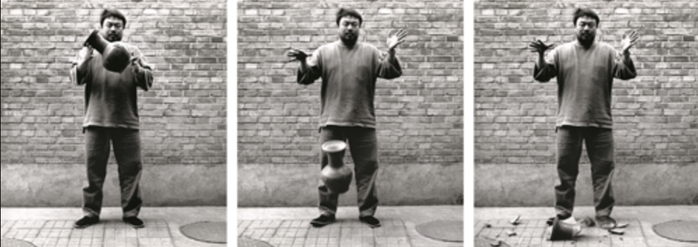 3 photos of Ai dropping a Han dynasty Urn